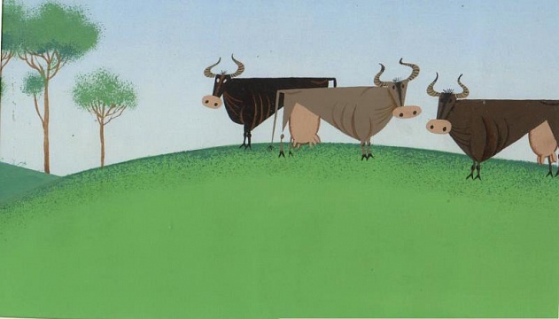 Три коровы на лугу